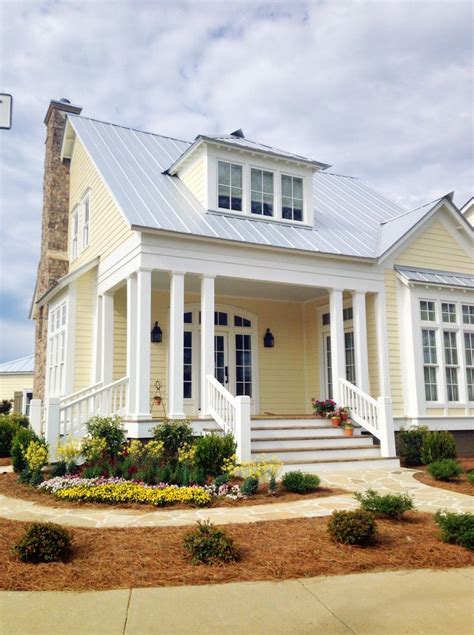 metal roof color yellow house|yellow house with charcoal roof.